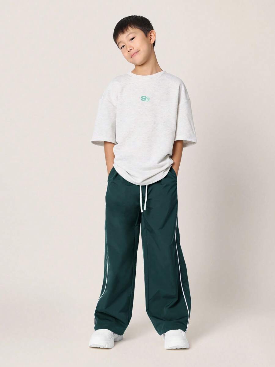 Tween Boys Comfy Oversized Fit Elbow Sleeve Tee With Small Graphic Print And Contrast Loose Fit Parachute Nylon Pant Teal Blue