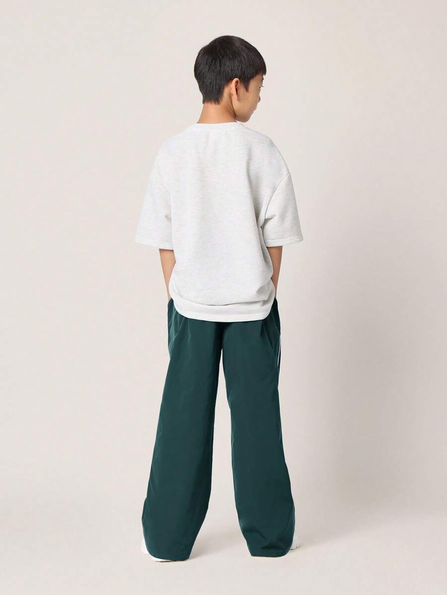 Tween Boys Comfy Oversized Fit Elbow Sleeve Tee With Small Graphic Print And Contrast Loose Fit Parachute Nylon Pant
