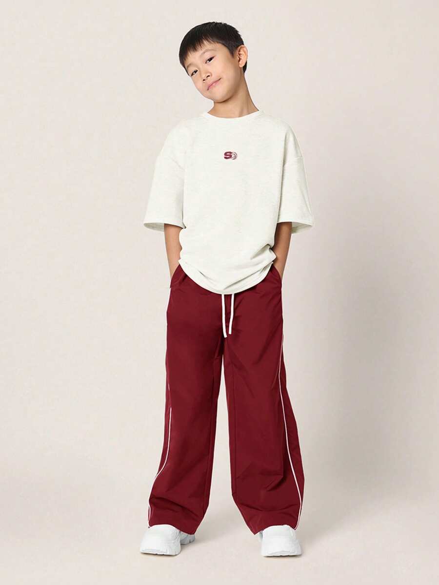 Tween Boys Comfy Oversized Fit Elbow Sleeve Tee With Small Graphic Print And Contrast Loose Fit Parachute Nylon Pant Red